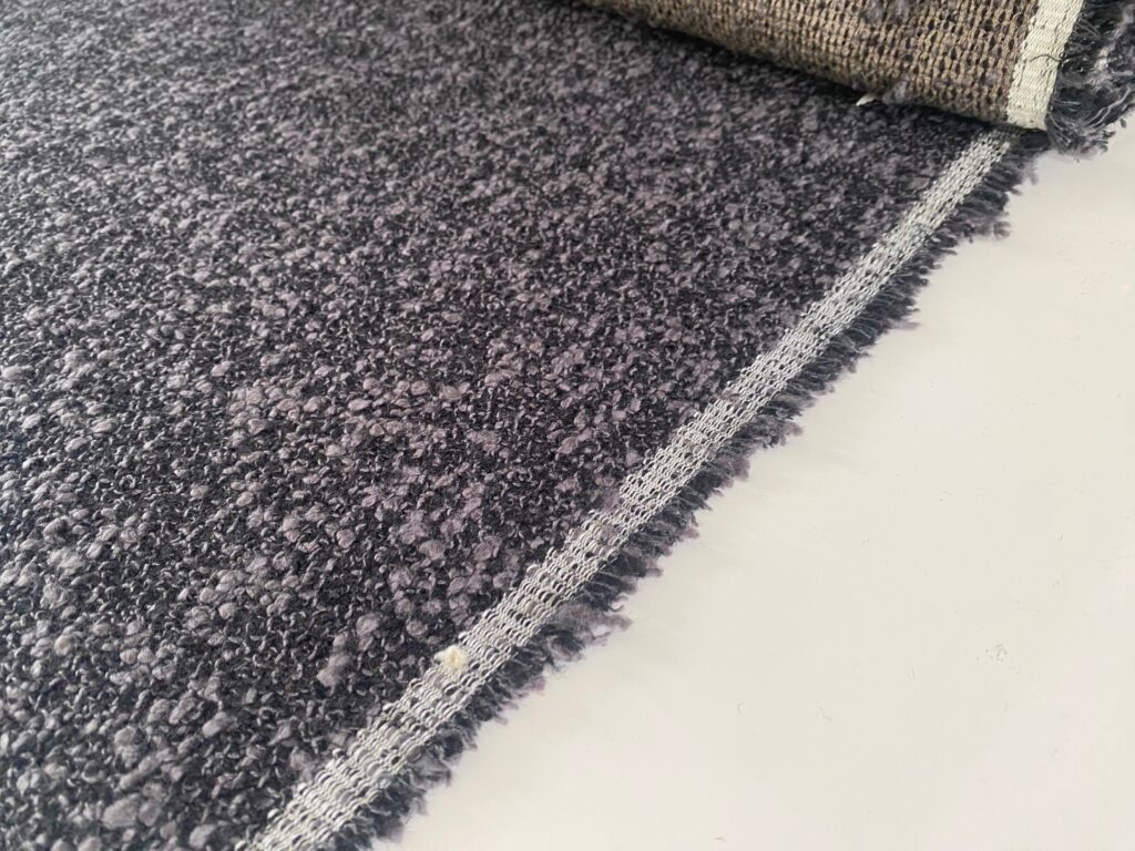 Kvadrat Sahco Zero 013 zwart grijs bouclé coupon